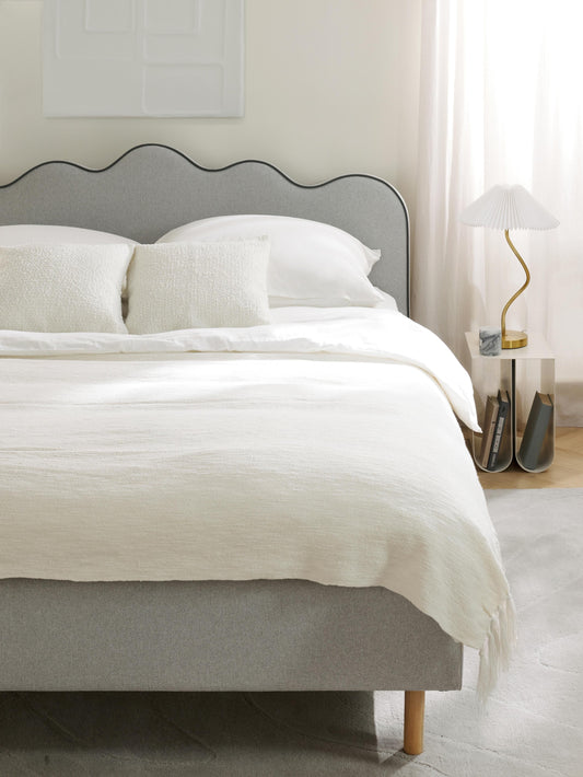 Romsen Upholstered Bed with Wavy Headboard