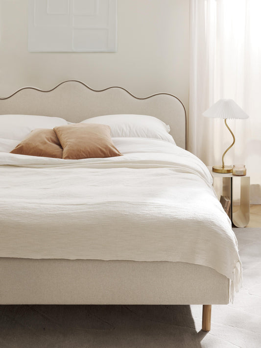Romsen Upholstered Bed with Wavy Headboard